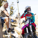 MX rider resting with his dad