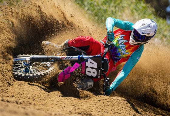 MX rider laying it down in a corner